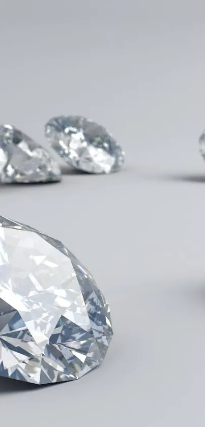 High-resolution mobile wallpaper with elegant sparkling diamonds on a gray background.
