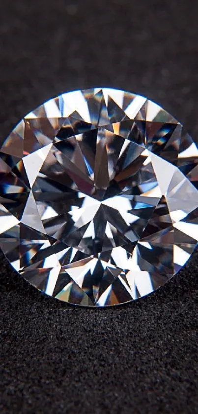 Close-up of a sparkling diamond on a black surface.