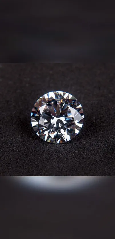 Glittering diamond on sleek black background.