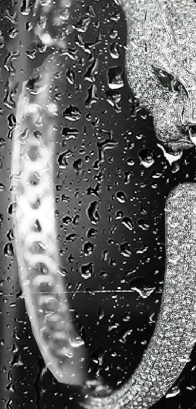 Diamond-encrusted panther sculpture with raindrop effect on black background.