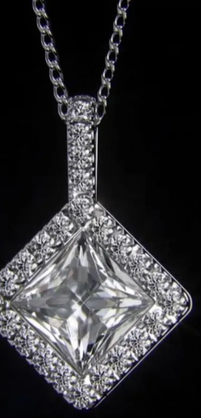 Elegant diamond pendant on black background.