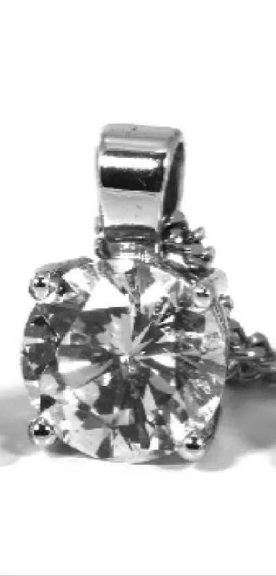 Close-up of a diamond pendant with reflective shine and intricate details.