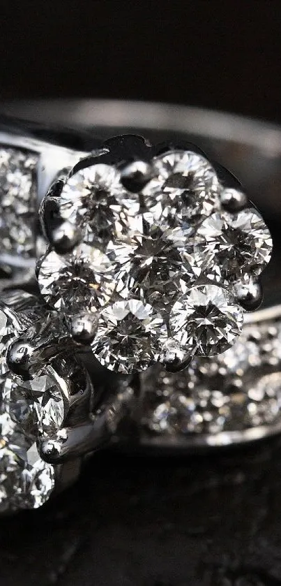Close-up of elegant diamond ring on dark background.