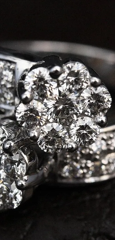 Close-up of sparkling diamond rings on a black background.