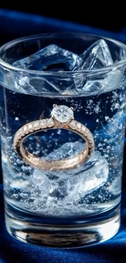 A diamond ring submerged in sparkling water with ice cubes.