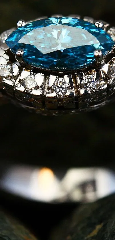 A luxurious diamond ring with a vivid blue center stone on a dark background.