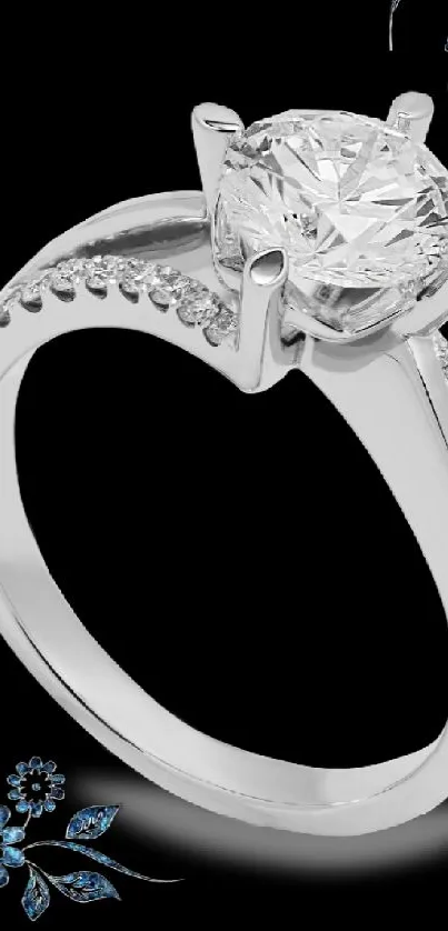 Elegant diamond solitaire ring on black background with floral accents.