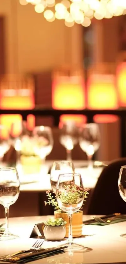 Elegant dining table setup with warm lighting and wine glasses.