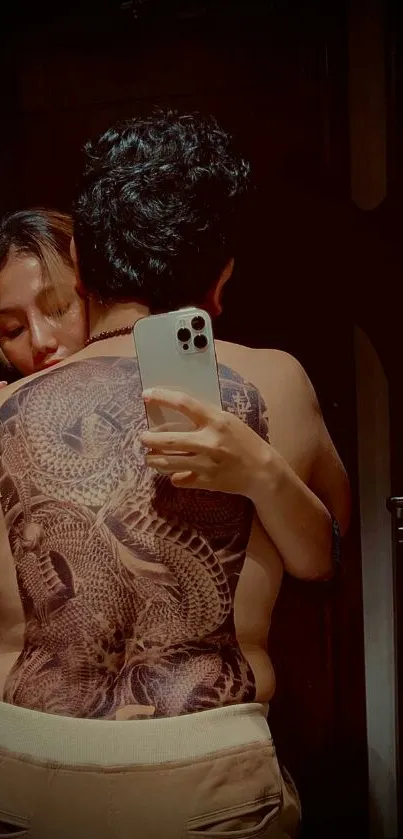 Elegant dragon tattoo art with intimate embrace on phone wallpaper.