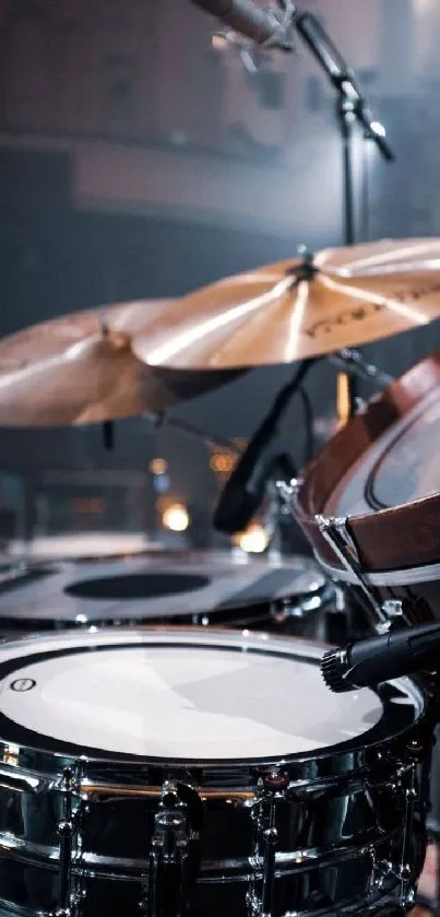 Close-up of a drum set on stage.