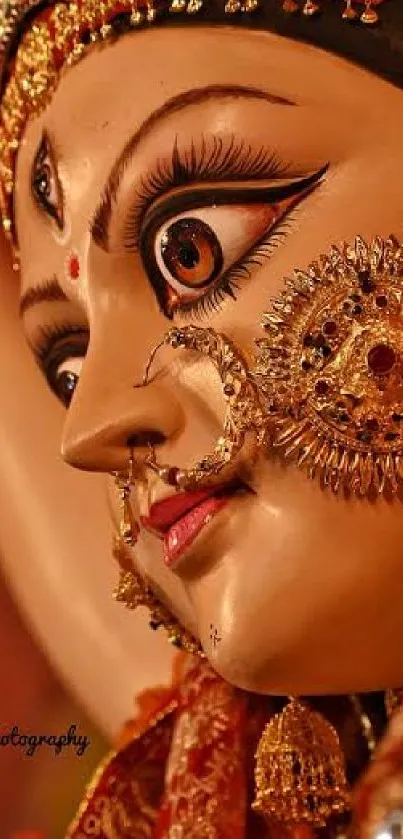 Close-up of Durga with intricate gold details and vibrant colors.