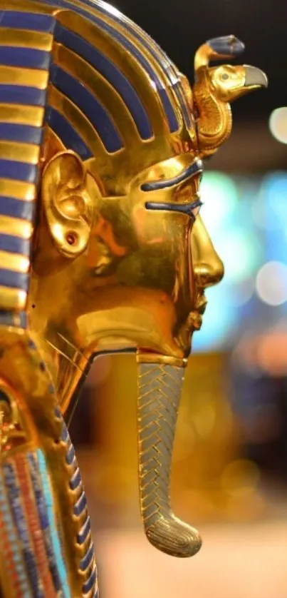 Golden Egyptian pharaoh sculpture with intricate details and deep historical allure.