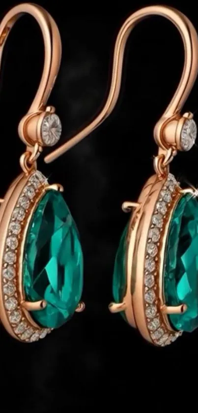 Elegant gold earrings with emerald gemstones.