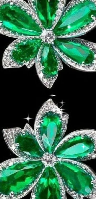 Emerald flowers with gemstones on black background.