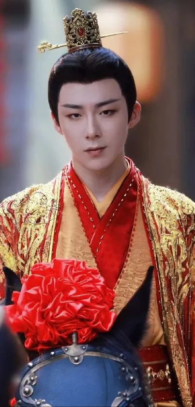 Emperor in ornate red and gold robes with a crown.