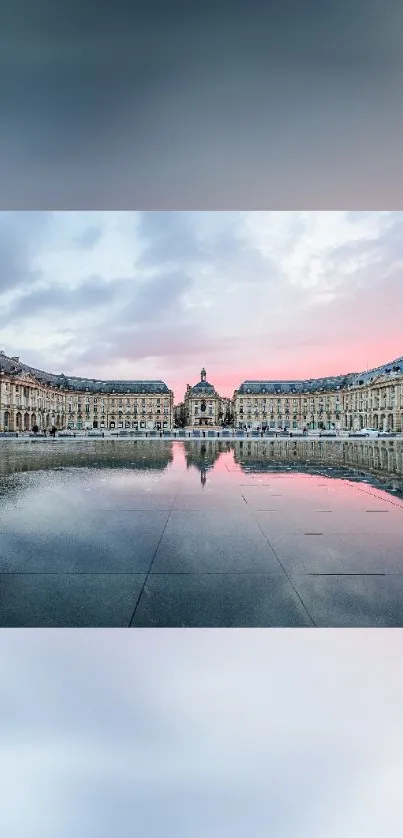 Reflected classical architecture at sunset.