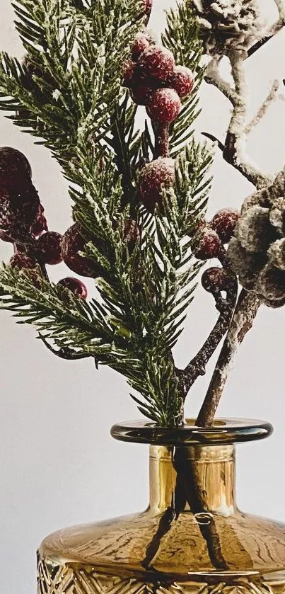 Elegant festive arrangement with pinecones in a glass vase.