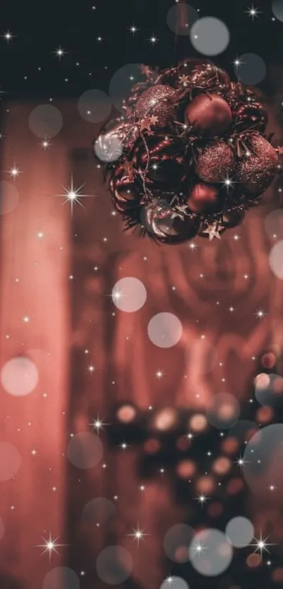 Festive mobile wallpaper with crimson ornaments and bokeh effect.