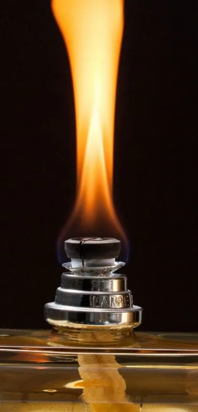 Elegant flame against a dark background, perfect for phone wallpaper.