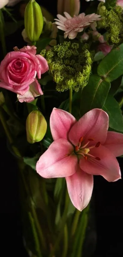 Elegant floral bouquet with pink lilies and roses against a dark backdrop.