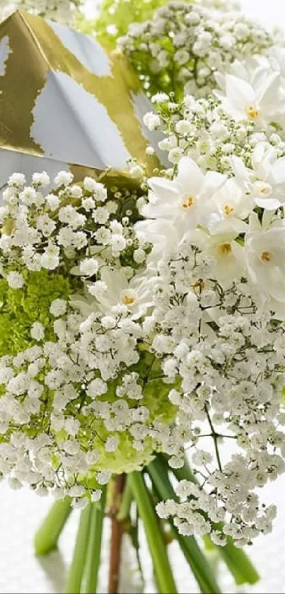 Elegant bouquet with white flowers and green accents on white background.