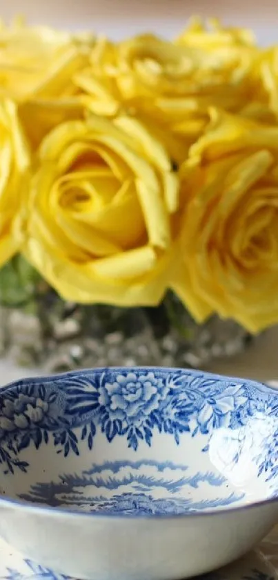 Elegant blue floral bowl with yellow roses.