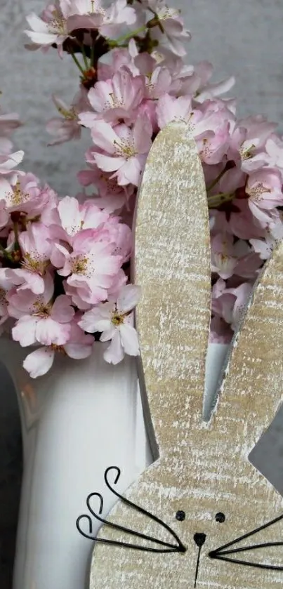 Pastel flowers with a bunny in a rustic vase.