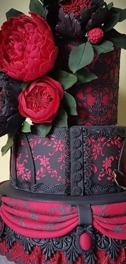 Elegant floral cake with red blooms and black lace design.