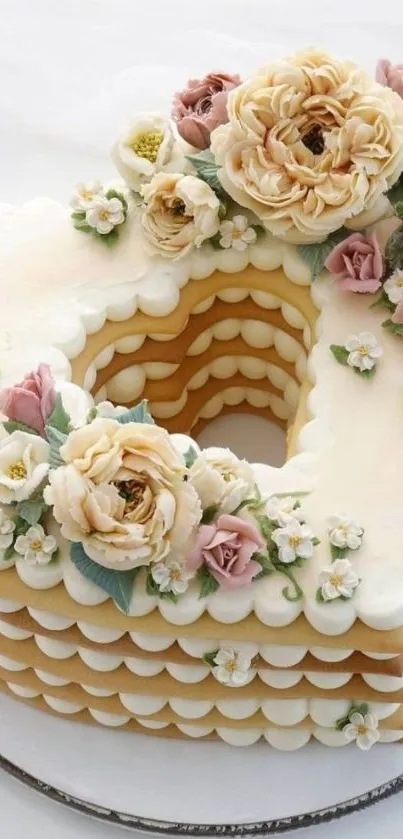 Heart-shaped cake with floral decorations.