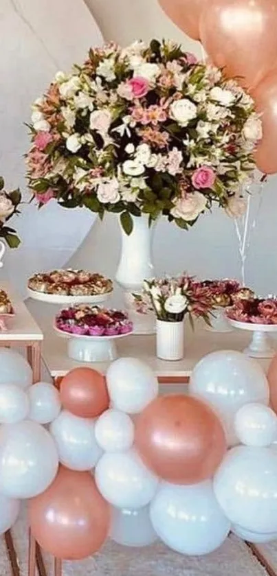 Elegant floral centerpiece with pastel balloons.