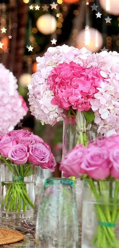 Elegant table setting with pink flowers and ambient lighting.