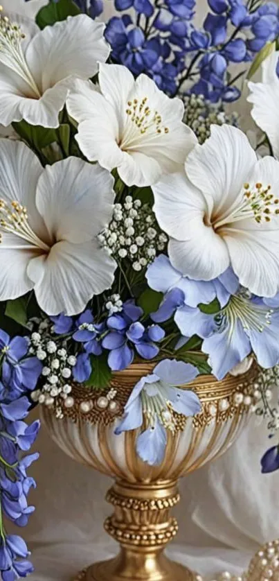 Elegant white and purple flowers in a gold vase.