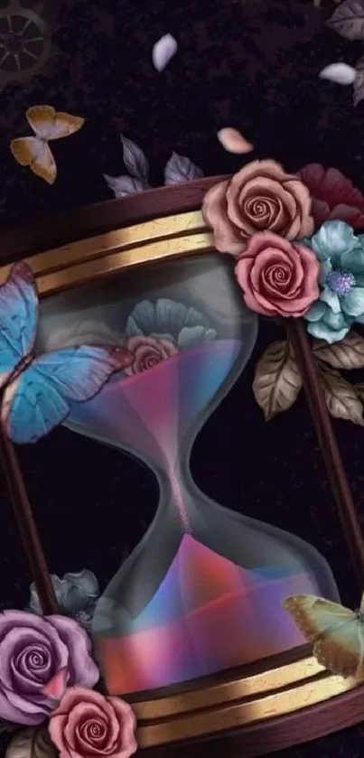 Hourglass with roses and butterflies on a dark background.