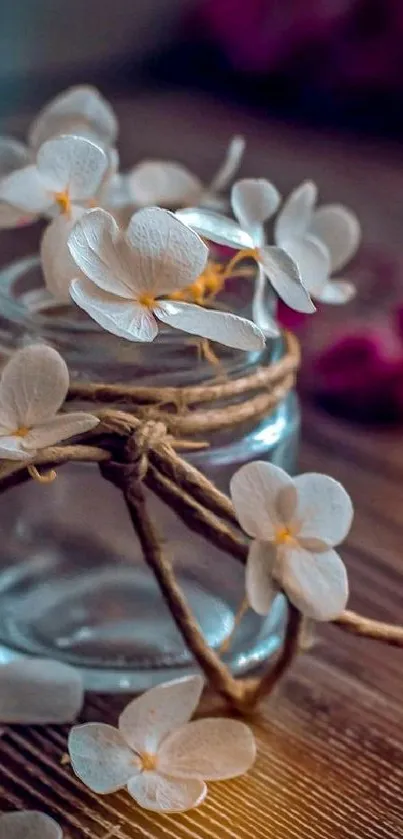 Elegant white flowers in a rustic jar against a brown background.