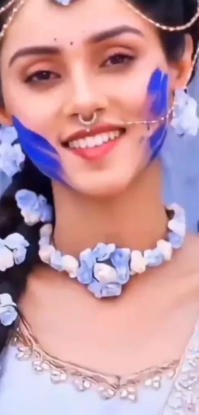 Model with floral jewelry and blue makeup for mobile wallpaper.