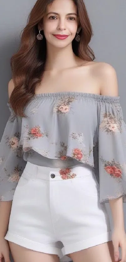 Woman in floral off-shoulder top with grey background.