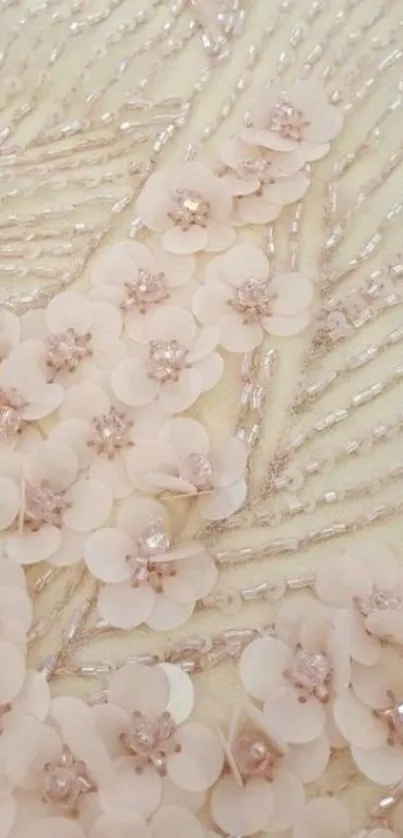 Elegant floral wallpaper with peach tones and intricate beaded details.