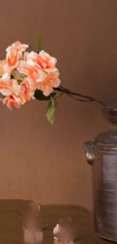 Elegant vase with pink flowers on brown background.