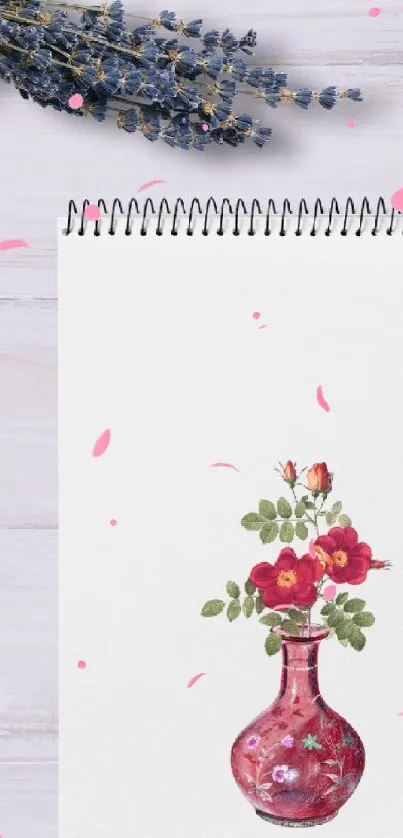 Floral vase on notebook with white background.