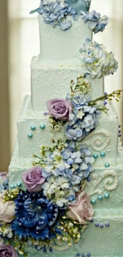 Elegant white wedding cake with floral decoration.