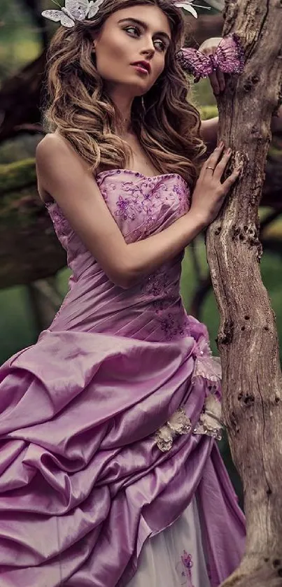 Woman in lilac dress leaning against tree in forest background.