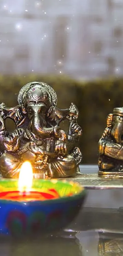 Decorative display of Ganesha with diya for mobile wallpaper.