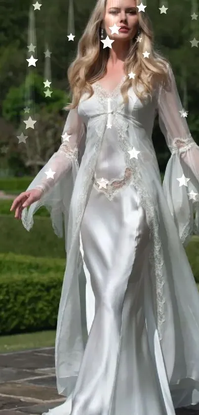 Woman in elegant white gown walking in lush garden.