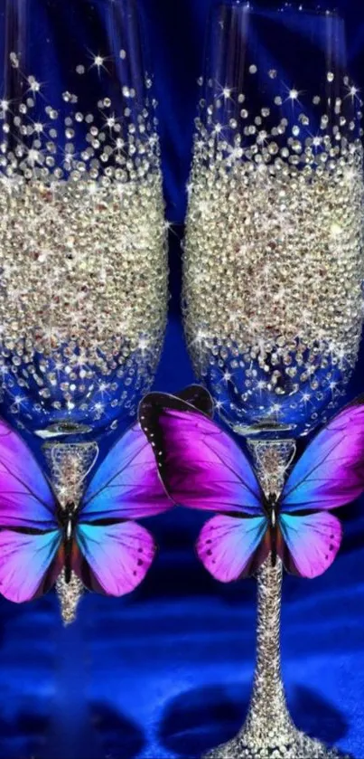 Champagne glasses and butterflies on royal blue background.