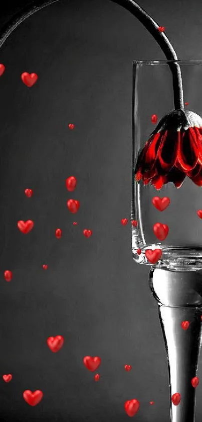 Artistic wallpaper featuring a glass with a red flower against a gray background.