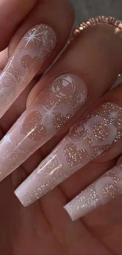 Elegant coffin-shaped glitter nails design with sparkling details.