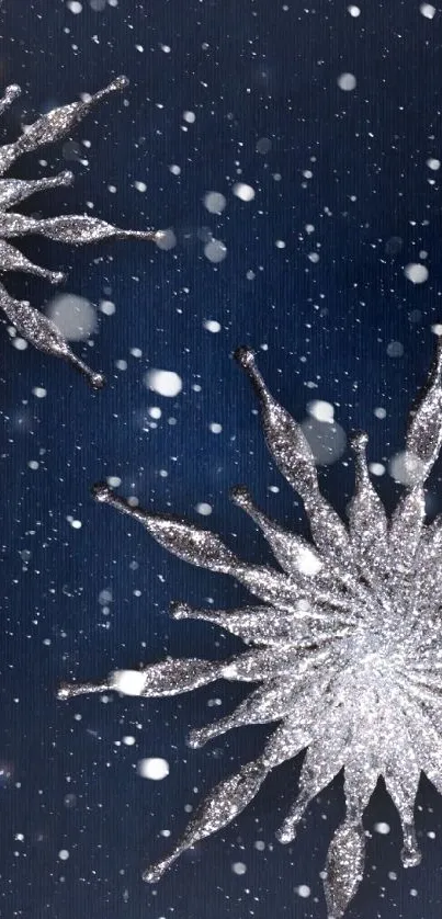 Shimmering silver snowflakes on dark blue background.