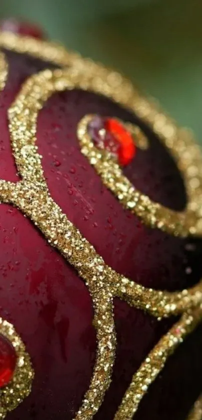 Close-up of burgundy and gold glitter ornament on mobile wallpaper.