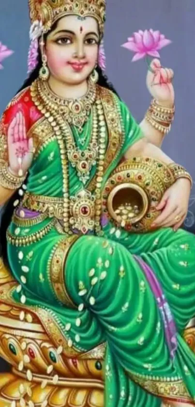 Divine goddess in green sari with lotus flowers on a mobile wallpaper.