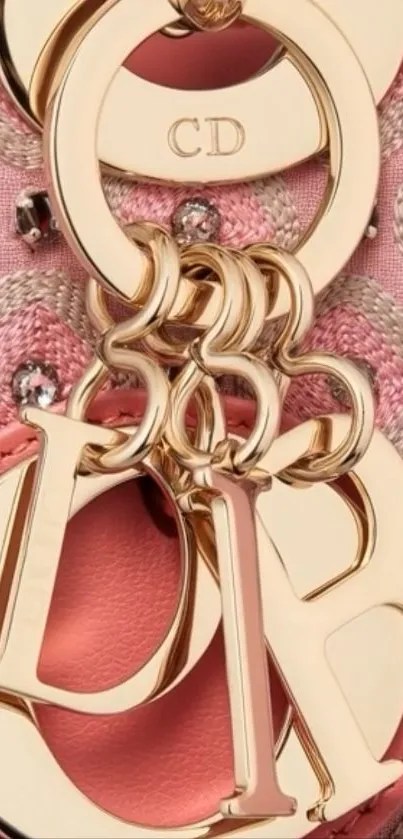 Luxurious gold and pink keychain wallpaper.